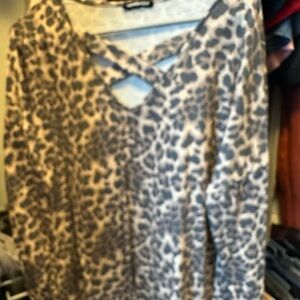 HEIMISH USA Animal Print V-Neck Blouse